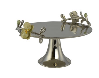 Decorative metal round cake serving cake platter with orchids