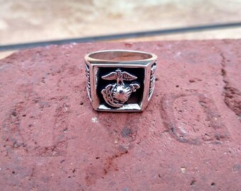 Custom Jewelry 8mm Black Tungsten Ring with USMC Marine Eagle Globe Anchor on Stone Finish Full & Half Sizes 5-15 Custom Jewelry 8mm Black Tungsten Ring with USMC Marine Eagle Globe Anchor on Stone Finish Full & Half Sizes 5-15