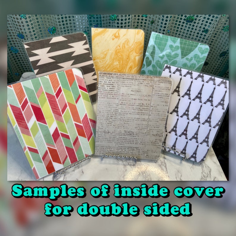May include: Samples of inside covers for double-sided notebooks. The covers feature a variety of patterns, including geometric designs, a newspaper print, and a pattern of Eiffel Towers and hearts.