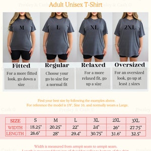 May include: A size chart for a unisex t-shirt, showing the different sizes and measurements in inches. The chart includes the width and length of the shirt for sizes S, M, L, XL, 2XL, and 3XL. The chart also includes a description of the fit for each size, including fitted, regular, relaxed, and oversized.