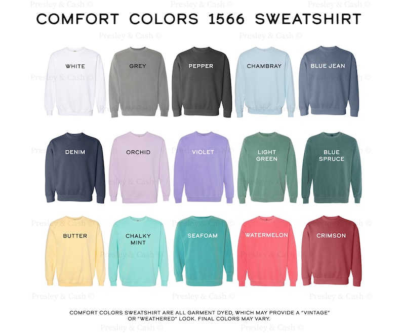 Op de afbeelding: Een tabel met 15 verschillende kleuren sweatshirts, elk met de kleurnaam erbij. De kleuren zijn wit, grijs, peper, Chambray, spijkerblauw, denim, orchidee, violet, lichtgroen, blauwspar, boter, krijtwit, zeeschuim, watermeloen en karmijnrood. De tekst "COMFORT COLORS 1566 SWEATSHIRT" staat bovenaan de tabel.