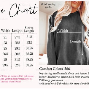 Op de afbeelding: Maattabel voor een sweatshirt met afmetingen in inches voor breedte, lengte en mouwlengte. De tabel toont maten S tot en met 3XL. Het sweatshirt is grijs en heeft een duurzame dubbele naadmouw en zoom. De stof is garment-gekleurd, wat een zachte kleur en textuur geeft. Het is gemaakt van 100% ringgesponnen katoen met een twill-tape nek en schouders voor extra duurzaamheid. Comfort Colors 1566.