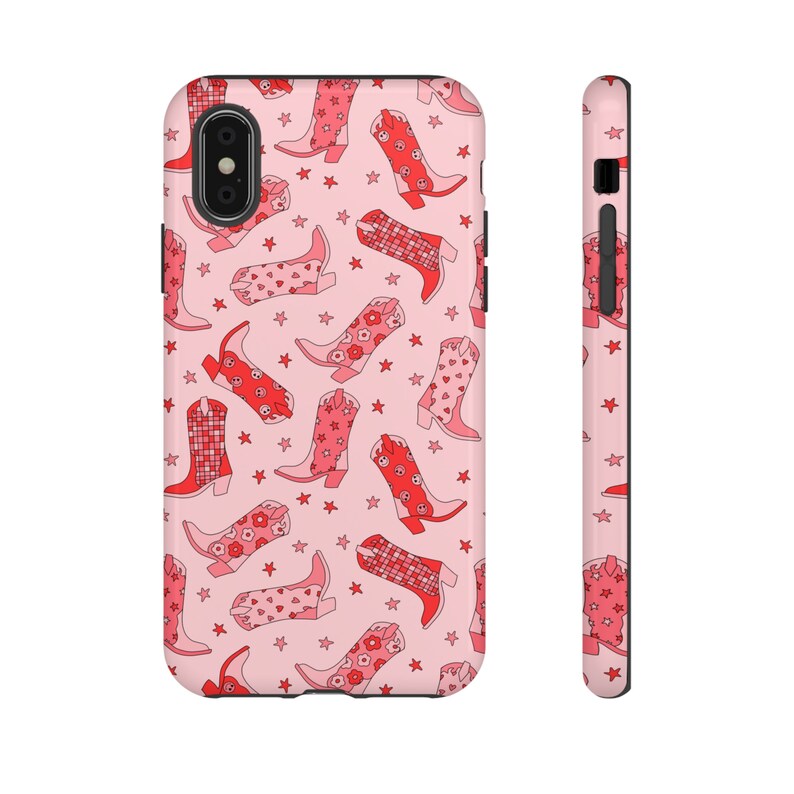 May include: A pink phone case with a pattern of red cowboy boots and stars.