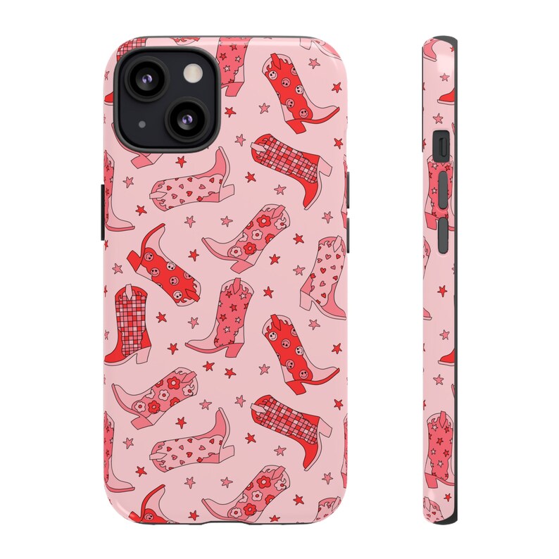 May include: Pink phone case with a pattern of red cowboy boots and pink stars.