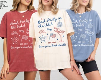 May include: Three t-shirts in different colors with a white graphic design that says "Bach Party in the USA" with a martini glass, fireworks, sunglasses, and a cowboy hat. The text "EST. 2025 Jennifer's Bachelorette" is also included on the shirts.