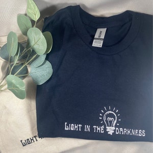 Embroidered T-shirt; Light in the Darkness