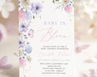May include: A baby shower invitation with a floral design in shades of pink, blue, and white. The text reads "Baby in Bloom" and includes the name "Elisabeth Peterson", the date "Saturday, March 12, 4 PM", the location "Ring Caffee | 12 Butterfly Lane, Maryland 1234", and RSVP information.