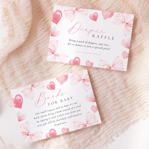 Nœud rose, coeur rouge, livres de baby shower pour enceinte, modèle de carte Coquette, baby shower de la Saint-Valentin, tombola de couches en coeur