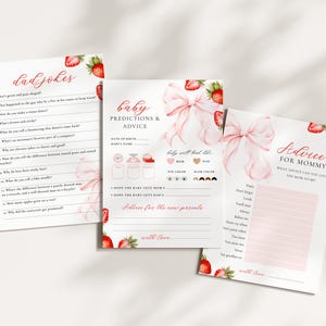 May include: Three baby shower game cards with a strawberry and bow design. The cards include prompts for "Dad Jokes", "Baby Predictions & Advice", and "Advice for Mommy". The text is in red, and the overall design is soft and feminine.