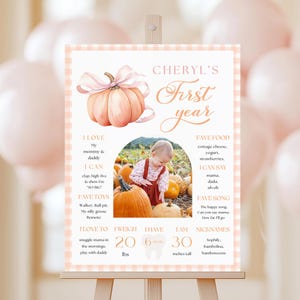 Plantilla de letrero de hito de primer cumpleaños con lazo rosa de calabaza, decoración de cuadros vichy para fiesta de primer cumpleaños de otoño, tablero de hitos imprimible en Canva
