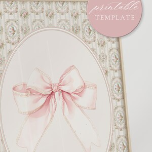 May include: A printable template featuring a pink bow with a white lace trim, set against a background of a delicate floral pattern.