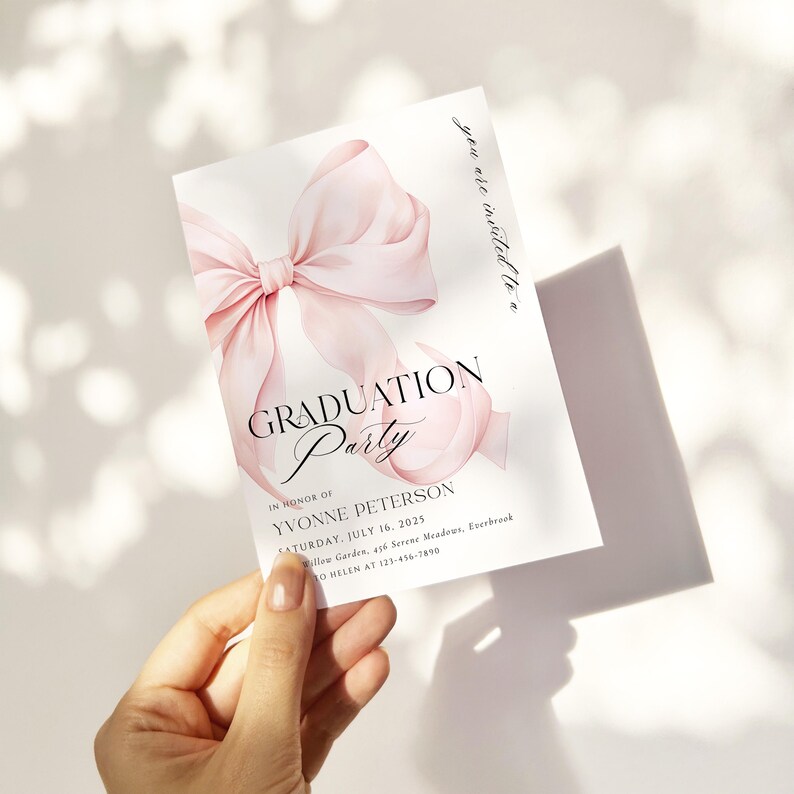 May include: A pink graduation party invitation with a watercolor illustration of a large pink bow. The text reads "You are invited to a Graduation Party in honor of Yvonne Peterson, Saturday, July 16, 2025, Willow Garden, 456 Serene Meadows, Everbrook, OH Helen at 123-456-7890."
