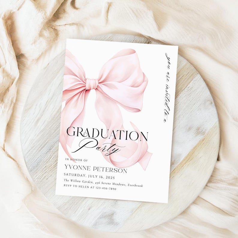 May include: A pink graduation party invitation with a large pink bow on the top. The text reads "You are invited to a Graduation Party" in honor of Yvonne Peterson. The date is Saturday, July 16, 2025. The location is The Willow Garden, 456 Serene Meadows, Everbrook. RSVP to Helen at 123-456-7890.
