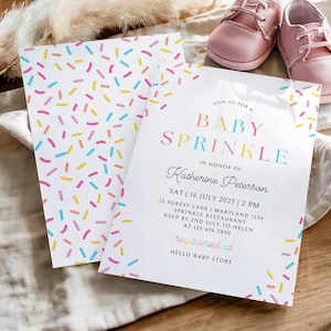 May include: Baby Sprinkle invitation with colorful confetti design. The invitation features the text "Baby Sprinkle" and event details. Pink baby shoes are in the background. The invitation is for Katherine Peterson.
