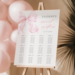 May include: A white Sweet Sixteen seating plan on an easel, with a pink watercolour bow and the text "YVONNE'S sweet sixteen 16.07.2025". The chart has table numbers and space for guest names.