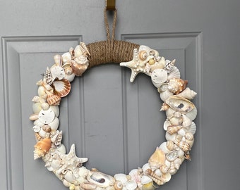 0NEW**** Beautiful 20” real seashell wreath wall hanger with starfish and rope accent