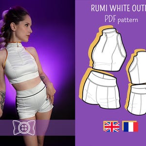 Peut inclure: Ensemble blanc en satin composé d'un crop top et d'un short, avec des bordures noires et des détails dorés. L'image présente également un patron PDF de la tenue et le texte "RUMI WHITE OUTFIT PDF pattern".
