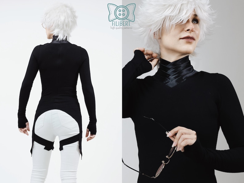 May include: A black long-sleeved top with a high collar featuring a crisscross satin ribbon detail. The garment has an asymmetrical hemline that extends down the back and includes straps that wrap around the upper thighs. The logo Filibert is visible.