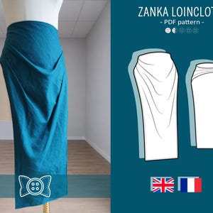 Può includere: Un perizoma color teal drappeggiato su un manichino. Il tessuto è raccolto in vita e scende fino alle caviglie. L'immagine include il testo "ZANKA LOINCLOTH - PDF pattern" e illustrazioni del capo. Sono presenti anche le bandiere britannica e francese.