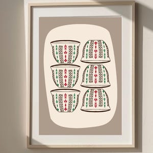 May include: A framed print of six stylized cups with a geometric pattern in red, green, and black on a beige background.