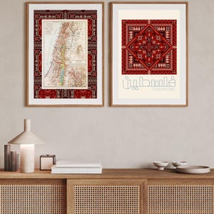 May include: Two framed prints with a red and black patterned border. The print on the left is a vintage map of Palestine. The print on the right features a red and black geometric pattern with the word "Palestine" in Arabic script.
