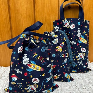 Handmade Space kids party/gift  bags. Fabulous keepsake bags. Choice of size and style. Reusable, washable 100% cotton bag. UK made.