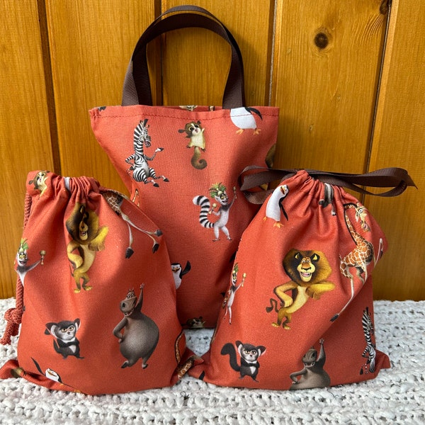 Handmade Madagascar party/gift bags. Fabulous keepsake bag. Choice of size and style. A sustainable & reusable 100% cotton  bag. UK made.