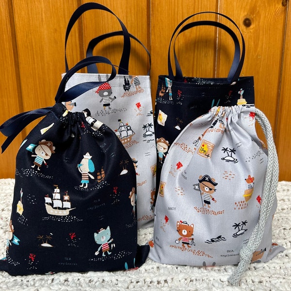 Handmade ‘Pirates Ahoy!’ party/gift bags. Fabulous keepsakes. Choice of size, colour and style. Sustainable, washable 100% cotton. UK made.