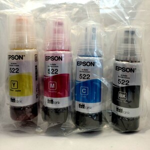 May include: Four Epson ink bottles, one each of yellow, magenta, cyan, and black. Each bottle is labeled with the Epson logo, the ink color, and the ink bottle number 522.