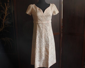 1960s vintage lace pale pink dress with gorgeous pointed neckline and empire waist short sleeves mid calf tea length fitted