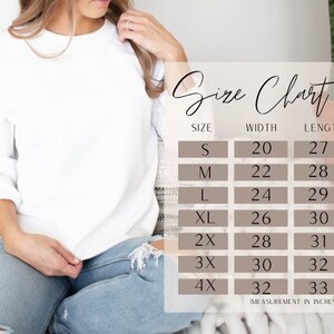 May include: Size chart for a white sweatshirt with measurements in inches for width and length. Sizes include S, M, L, XL, 2X, 3X, and 4X.