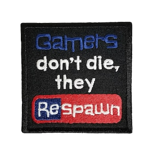 May include: Black embroidered patch with white text that reads "Gamers don't die, they respawn" with a red and blue bar underneath that reads "Respawn".