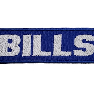 May include: A blue embroidered patch with the word "BILLS" in white lettering.