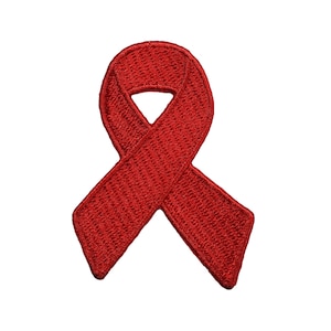 May include: A red ribbon, a symbol of awareness and support for various causes.