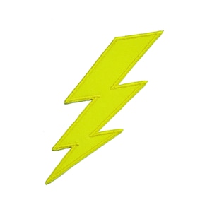 May include: A yellow lightning bolt shaped patch. The patch is made of fabric and has a stitched outline.