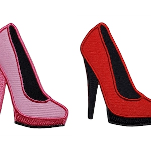 May include: Two embroidered iron-on patches of high-heeled shoes. One is pink and the other is red.