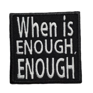 May include: Black embroidered patch with white text that reads "When is Enough, Enough".