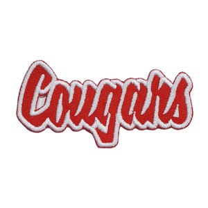 May include: Red embroidered patch with the word "Cougar" in white outlined lettering.