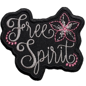 May include: Black embroidered patch with the words "Free Spirit" in silver thread and a pink flower in the center.