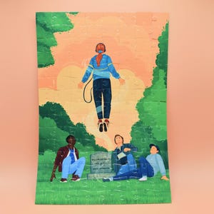 May include: A colorful puzzle featuring a scene with a person floating in the air, wearing headphones, above a group of people. The puzzle has a green and orange background, with a tombstone in the center. The artwork is a vibrant illustration.