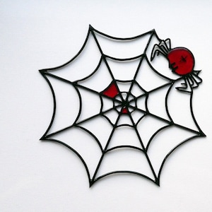 web made of metal wire, metal spider