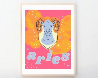 May include: A pink and orange illustrated print of the zodiac sign Aries. The illustration features a ram's head with large horns and the word "aries" in a retro font.
