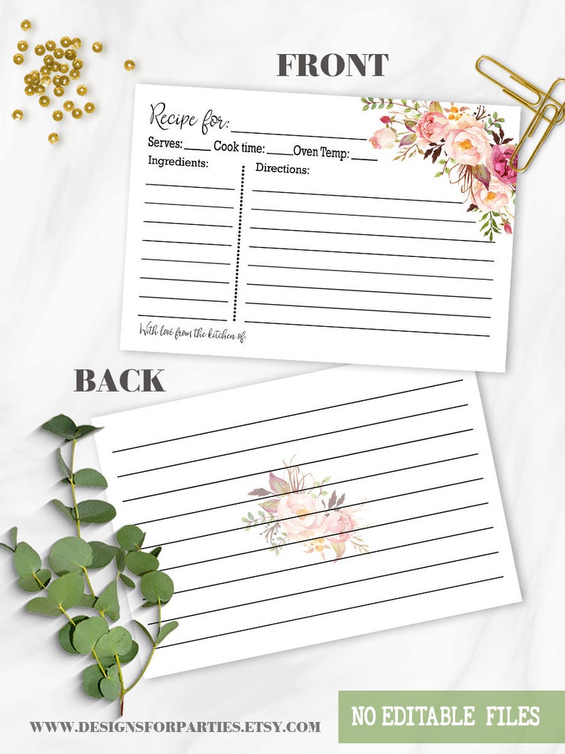 May include: White recipe cards with floral accents. The front of the card has space for recipe details, including ingredients and directions. The back features lined paper and a floral design. The text on the card reads "Recipe for" and "With love from the kitchen of."
