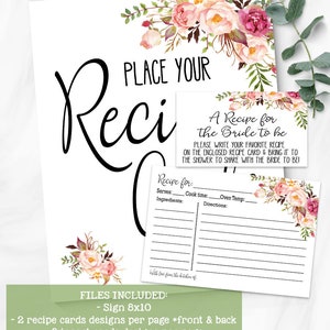 May include: A white recipe card set with floral accents. The set includes a large sign, recipe cards, and insert cards. Text includes "Place Your Recipe" and "A Recipe for the Bride to be". The cards have a watercolor floral design.