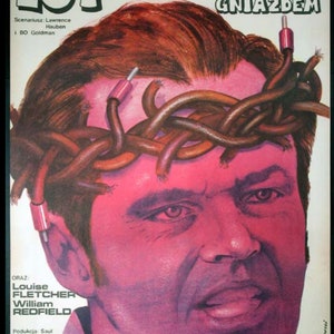 May include: A vintage movie poster with a close-up of a man's face, a crown of brown cables, and red details. The poster's title is "LOT NAD KUKUŁCZYM GNIAZDEM" and features "JACK NICHOLSON" at the top.