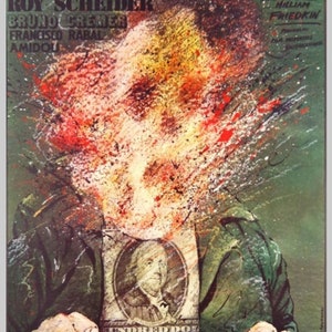 May include: A film poster for the movie "The French Connection" featuring Roy Scheider's face engulfed in flames and a £100 note with a portrait of George Washington.
