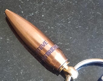 Quelque part, il y a une balle avec votre nom dessus ! Porte-clés balle de tireur d'élite .338 gravé