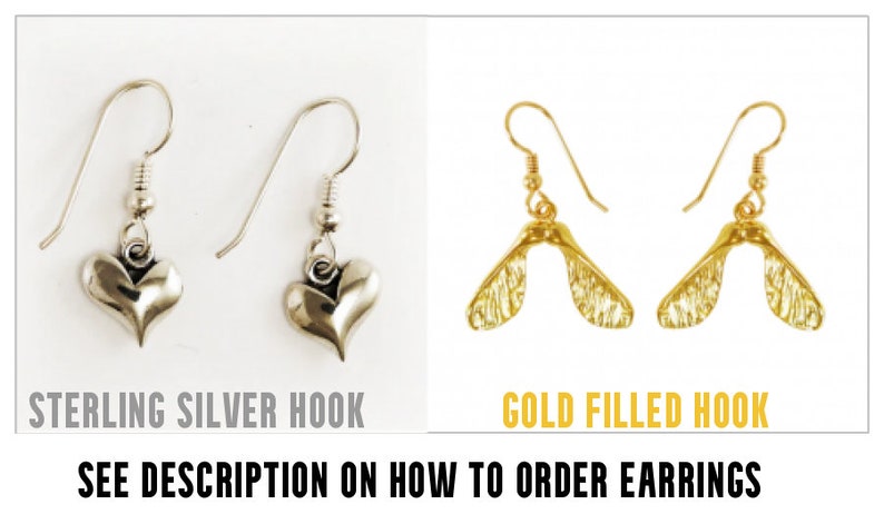 Puede incluir: La imagen muestra dos pares de pendientes. Un par con ganchos de plata de ley y dijes en forma de coraz&oacute;n. El otro par tiene ganchos ba&ntilde;ados en oro con un dise&ntilde;o de semilla de arce. El texto dice "STERLING SILVER HOOK" y "GOLD FILLED HOOK".