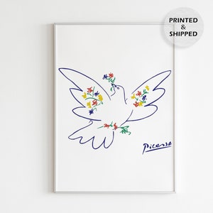 May include: A blue line drawing of a dove with a wreath of colorful flowers around its neck. The dove is facing left and has its wings spread. The drawing is signed "Picasso" in blue ink.