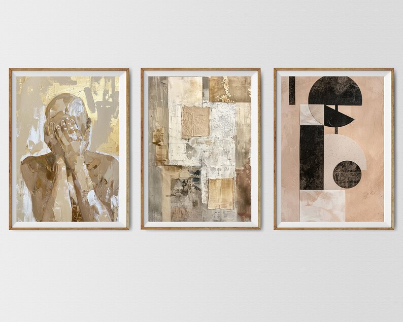 May include: Three framed abstract art prints with a neutral color palette. The first print features a nude figure with their face covered by their hands. The second print features a collage of geometric shapes in shades of brown and beige. The third print features a geometric design with black and white shapes on a beige background.
